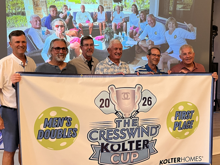 Men's Doubles first-place winners holding the 2026 Cresswind Kolter Cup banner